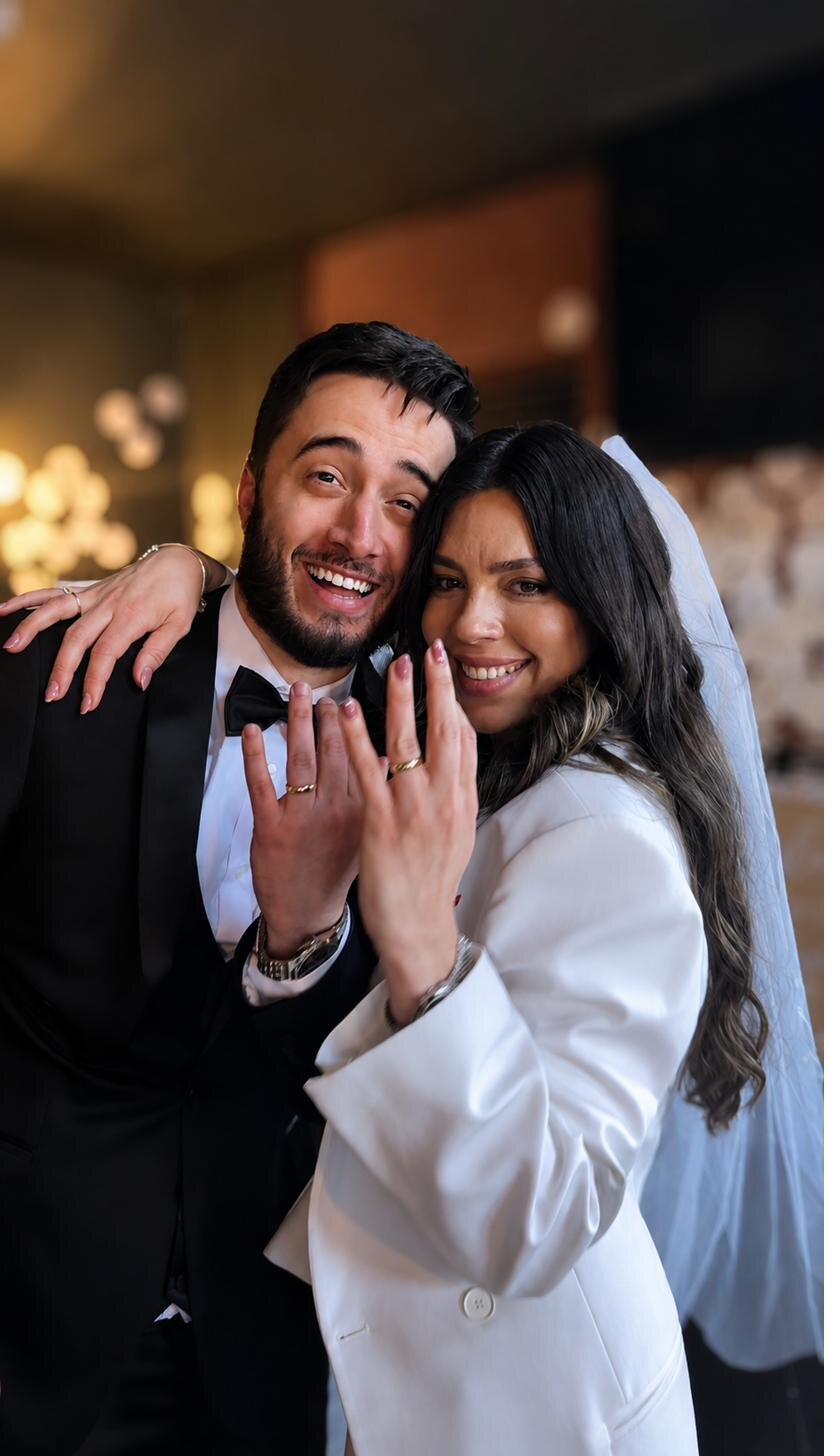 Wedding rings shown to camera